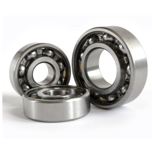 Image of 3 different sized engine bearings