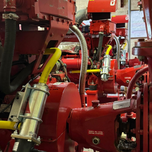 Image of three Peregrine fire pump heaters that have been installed on fire pump engines.